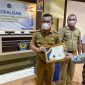 Kepala Dinas Pemberdayaan Masyarakat dan Desa (DPMD) Kabupaten Konawe, Keni Yuga Permana, menerima penghargaan dari KPPN. Selasa (15/03/2022). (*Ist/Kroscek). 
