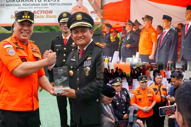 Bupati Konawe Utara, H. Ruksamin menerima cinderamata dan menyerahkan secara simbolis bantuan mobil operasionan pada Upacara HUT Basarnas Ke-52 Tahun digelar di Kantor Basarnas Kendari, Rabu (28/2/2024) pagi. (*Ist)
