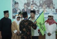 Sekda Konut menyambut kepulangan Jamaah Haji asal Kabupaten Konawe Utara di Auditorium UPBU Bandara Halu Oleo Kab. Konawe Selatan, pada Kamis, 18 Juli 2024.