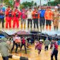 Tim gabungan melakukan tindakan upaya preventif di lokasi banjir kecamatan andowia. Selasa, (30/07/2024). 