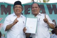 Dr. Ir. H. Asrun, M.Eng., M.Sc, bersama H. Ruksamin Calon Gubernur Sultra nomor urut Satu di kampanye dialogis Harus Selaras di Punggolaka. Minggu (13/10/2024).