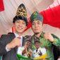 Bupati Konawe Utara terpilih Periode 2025-2023, H. Ikbar, S.H., M.H, Bersama Kepala Bidang (Kabid) Komunikasi Publik, Ardin Sito. A, S.Si., M.Si., (Kiri Batik Hijau) saat perayaan HUT Konut ke-18 Tahun.