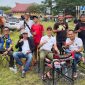 Bupati terpilih Konawe Utara, H. Ikbar, S.H., M.H., dalam ajang LAST LAP I CUP SEASON I 2025 memberikan semangat Tim balap 89 Konasara Racing Team dari Konawe Utara. Sirkuit Terminal Baruga. Kamis, (01/02/2025).