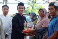 Ketua DPW PBB Sultra, H. Ikbar, S.H., M.H., menyerahkan Paket Qurban Idul Adha 1446 Hijriah di Konawe Utara.